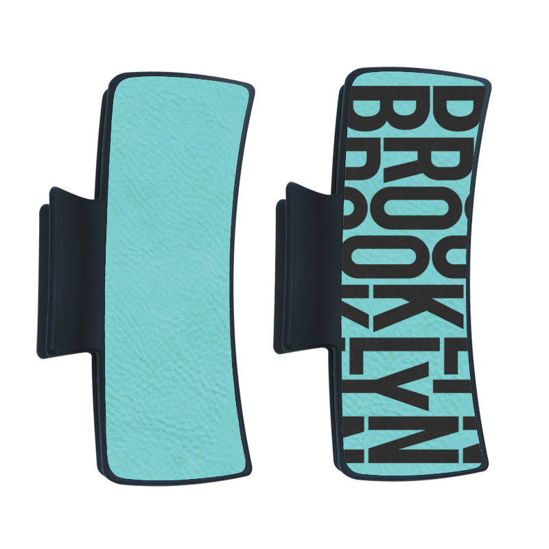 Laserbarer Haarclip aus Kunstleder Laserbarer Haarclip aus Kunstleder